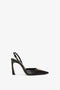 A Victoria Beckham Pointy Toe Sling back in Black Calf, featuring a stunning chain detail and a small gold decorative element on the front.