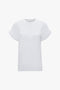 Oversized Victoria Beckham white short-sleeved t-shirt isolated on a white background.