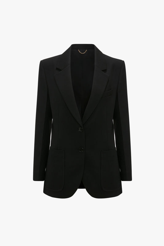 The Patch Pocket Jacket In Black by Victoria Beckham is displayed against a white background.