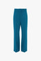 Teal-colored, high-waisted, Waistband Detail Straight Leg Trouser In Petroleum by Victoria Beckham with front pleats.