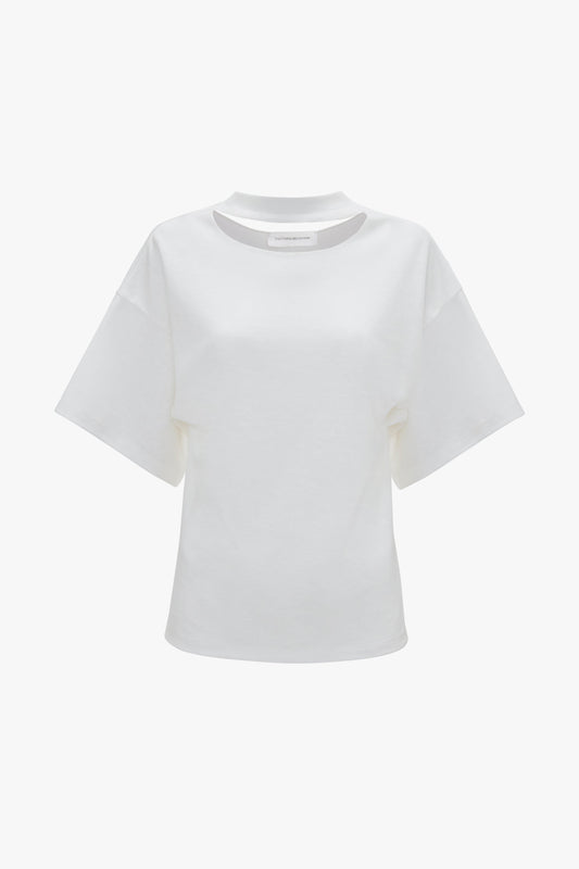 Victoria Beckham's Bonded Jersey Tee In White with crew neck, displayed against a plain background, exuding a sense of modern nonchalance with its relaxed cut.