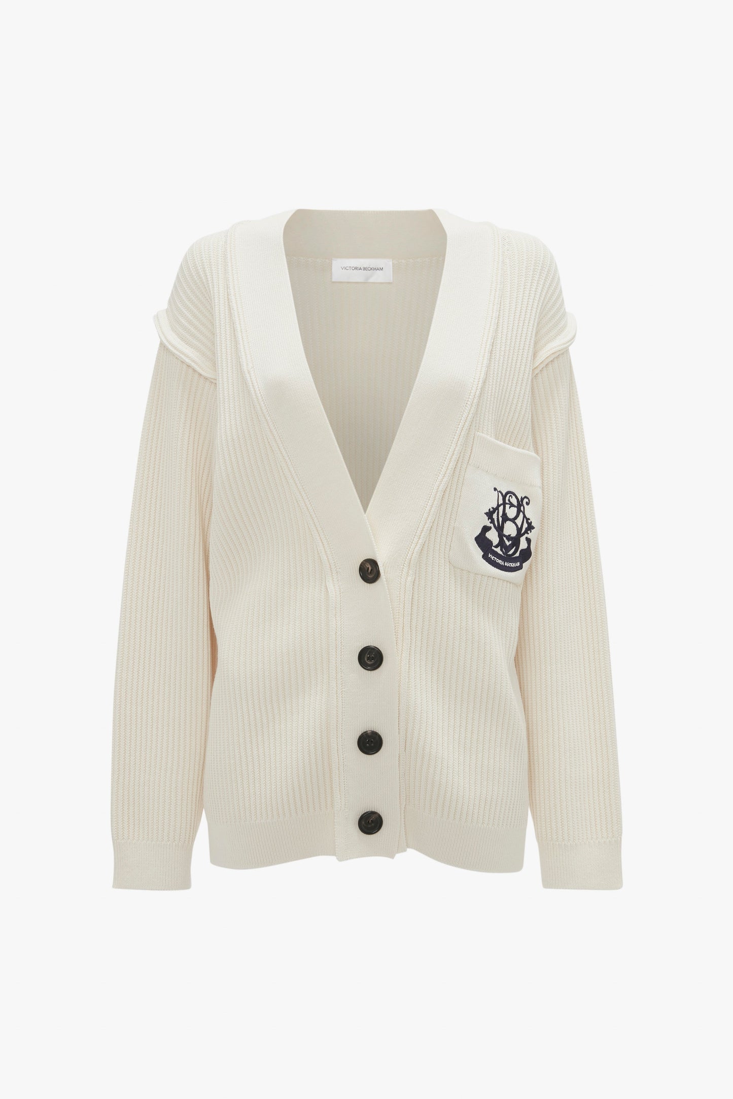 A Relaxed Fit Cardigan In Natural featuring black buttons and an embroidered anchor logo on the front pocket by Victoria Beckham.