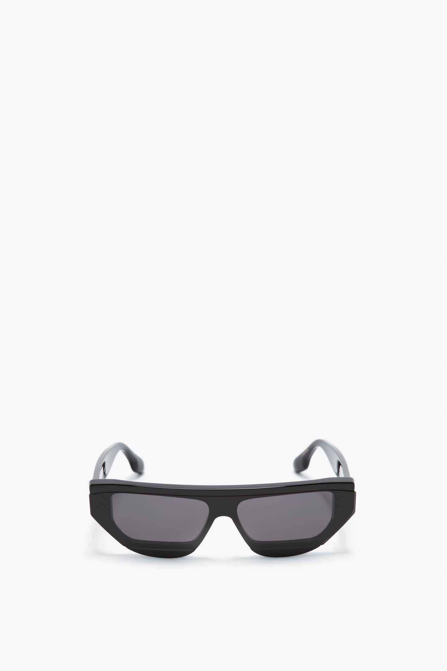 A pair of Layered Lens Visor Sunglasses In Black from the SS24 Victoria Beckham eyewear collection is displayed facing forward on a white background.