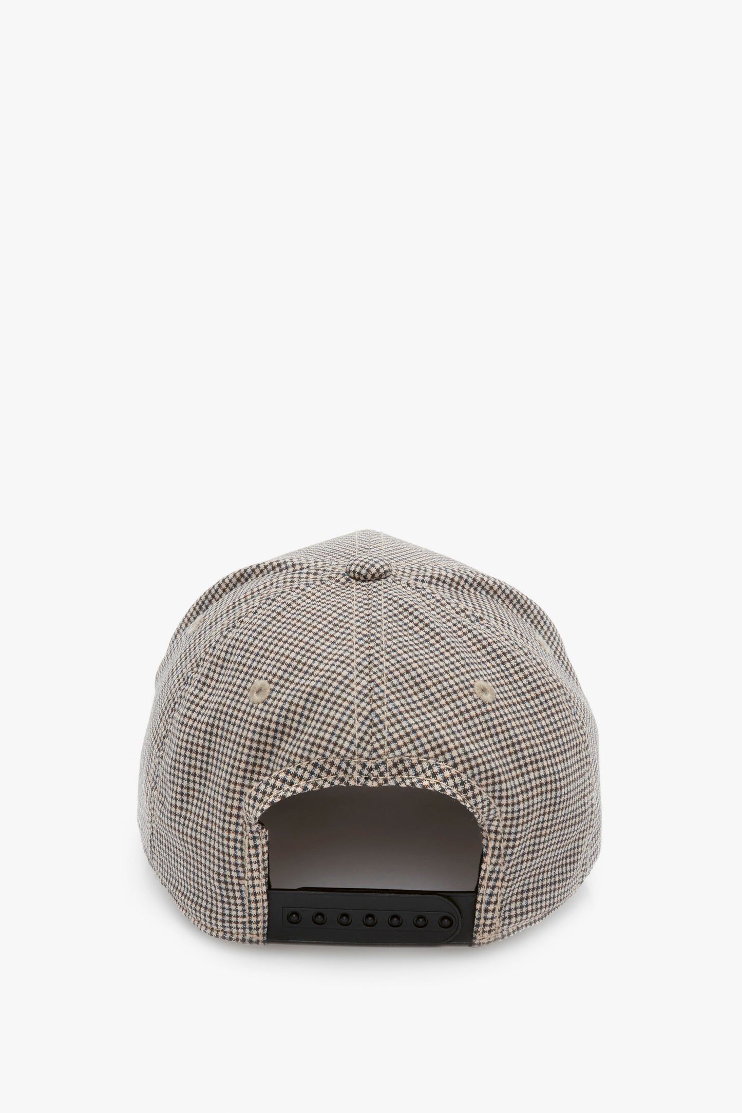 A beige and brown checkered baseball cap made from wool dogtooth check, viewed from the back, showcasing its minimalist design with an adjustable snapback closure. This is the Logo Cap In Dogtooth Check by Victoria Beckham.