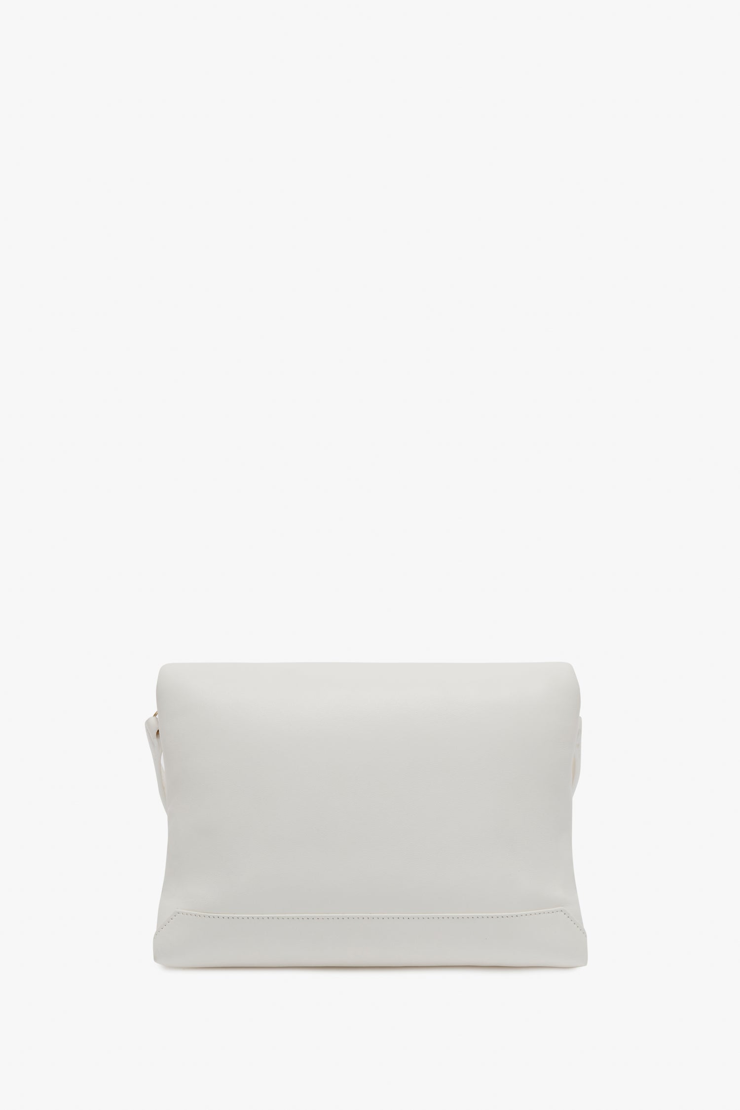 A plain white Victoria Beckham Puffy Chain Pouch Bag With Strap In White Leather is shown against a white background. The bag has a clean, minimalist look with no visible branding or embellishments but features a detachable shoulder strap for versatility.