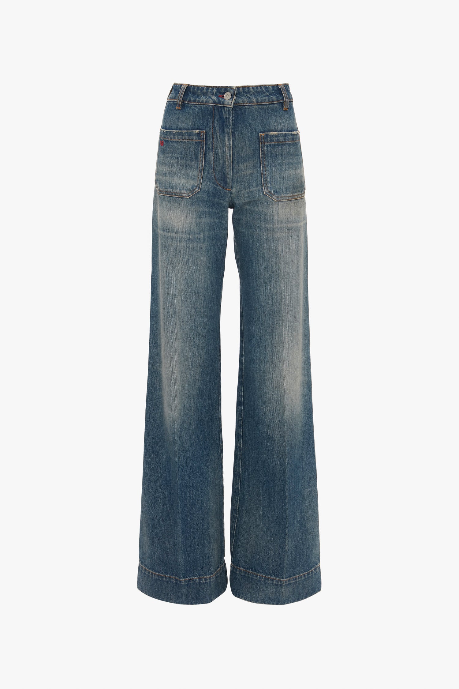 Wide-leg, high-waisted Alina High Waisted Jean In Indigrey Wash by Victoria Beckham with seventies-style pockets and faded details, displayed against a plain white background.