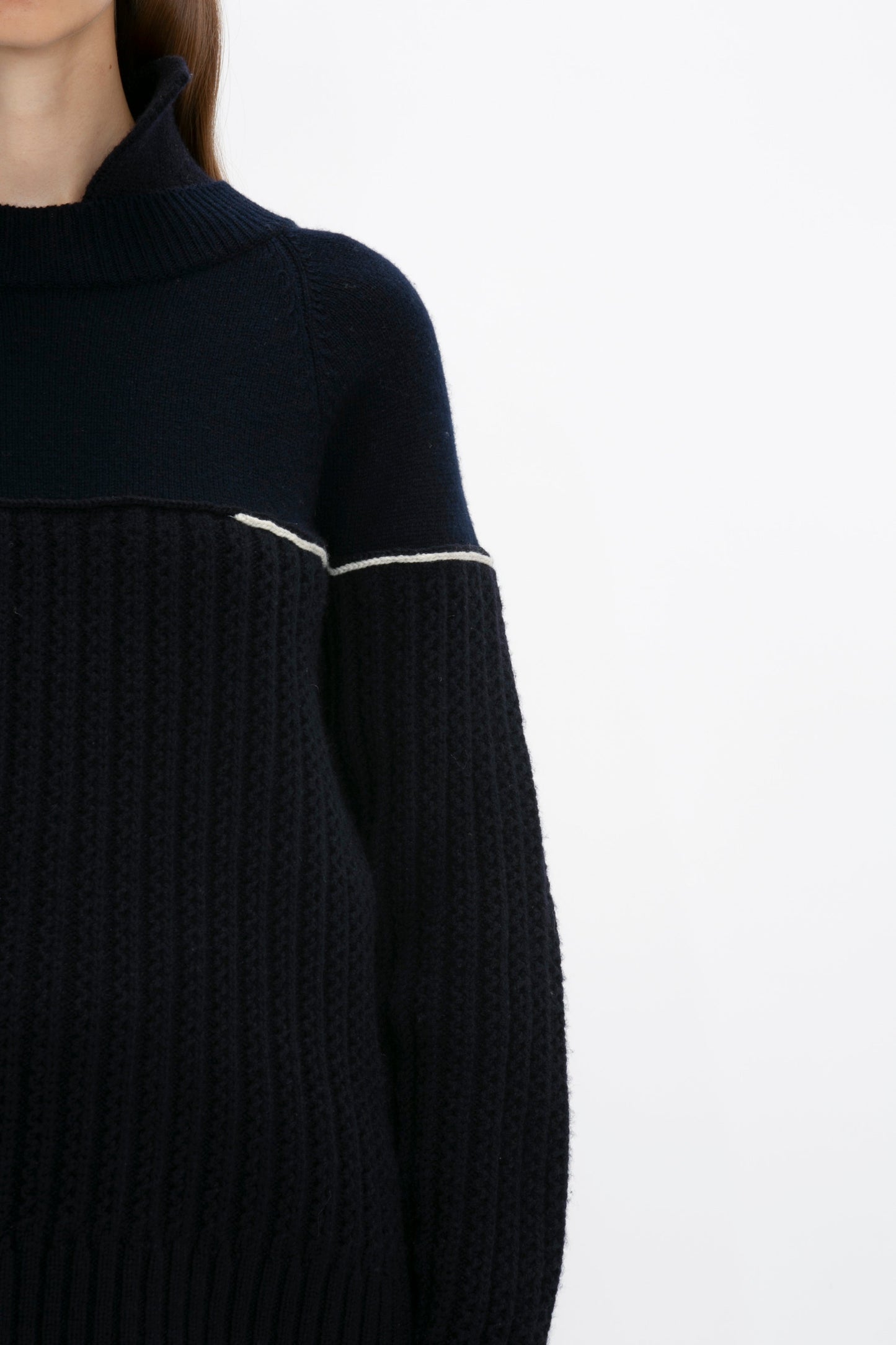 A person wearing a Victoria Beckham Collar Detail Jumper In Navy against a plain background.