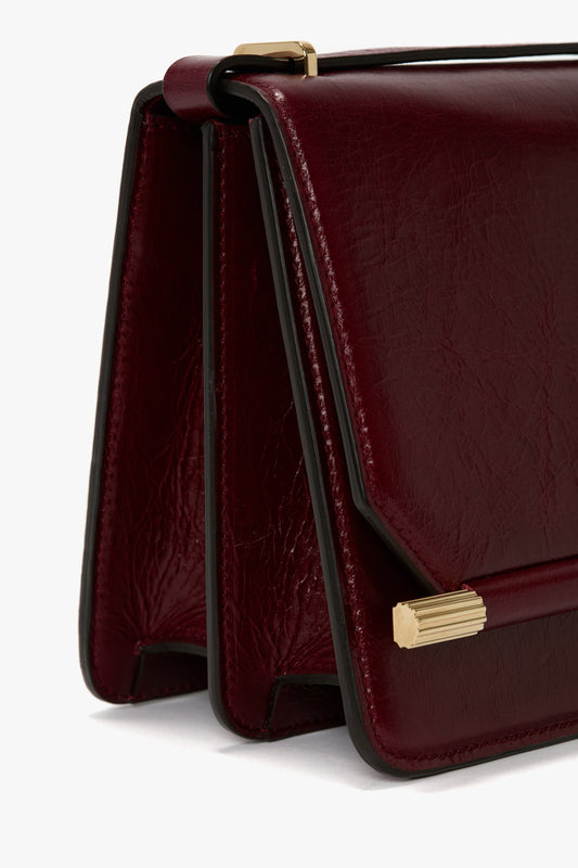 202 Crossbody Bag In Burgundy Distressed Leather