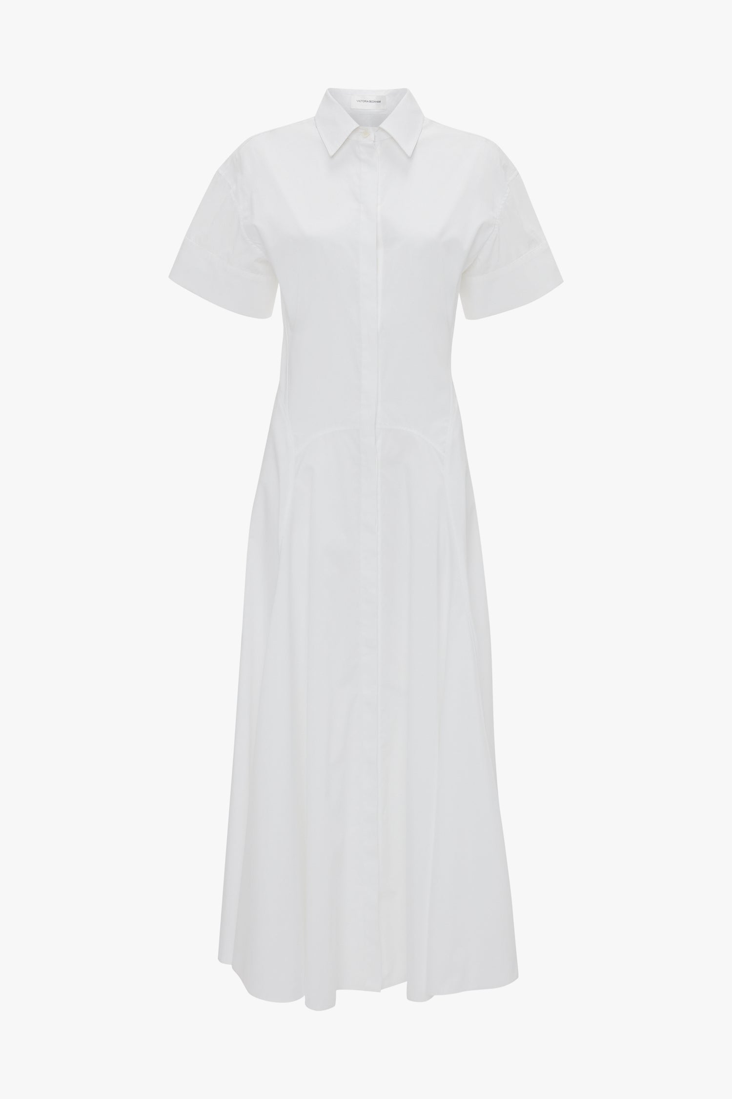 **Victoria Beckham Panelled Shirt Dress In White:** White short-sleeve, button-front collared midi dress in organic cotton poplin, featuring a tailored design on a plain background.