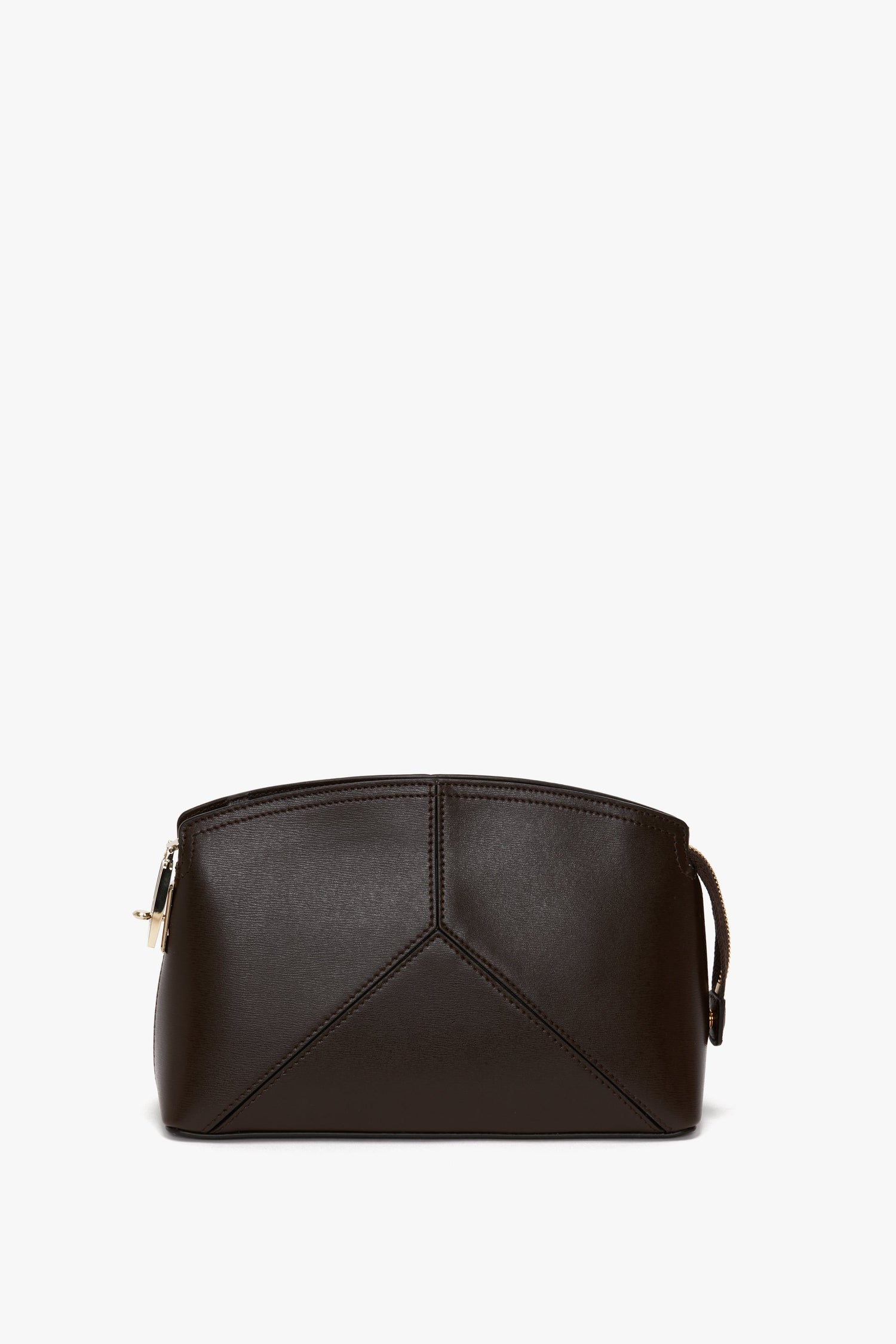 A small, dark brown calf leather Exclusive Victoria Crossbody Bag In Brown Leather by Victoria Beckham with a geometric design, featuring a zip closure and a small handle on one side, set against a plain white background.