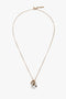 The Victoria Beckham Exclusive Resin Pendant Necklace In Light Gold-White features a chain-link pendant with a white and gray marble-like design, complete with a stylish T-bar closure.