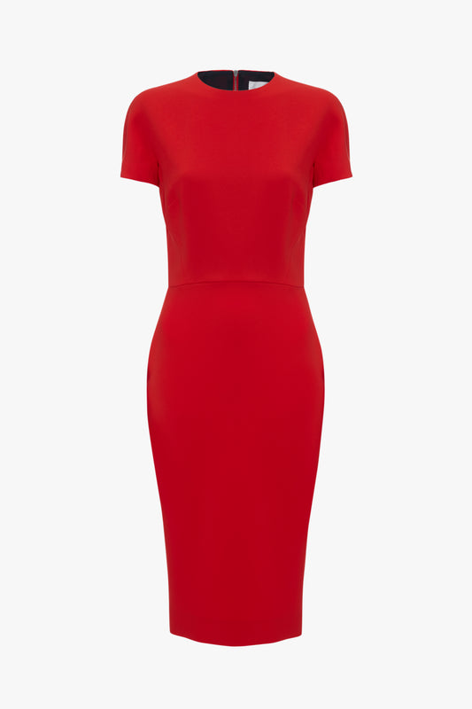 Victoria Beckham's bright red knee-length fitted T-shirt dress with short sleeves and a round neckline, isolated on a white background.