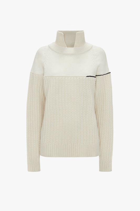 Collar Detail Jumper In Natural by Victoria Beckham featuring a high turtleneck, long sleeves, and a contrasting black chain stitch detail near the chest.