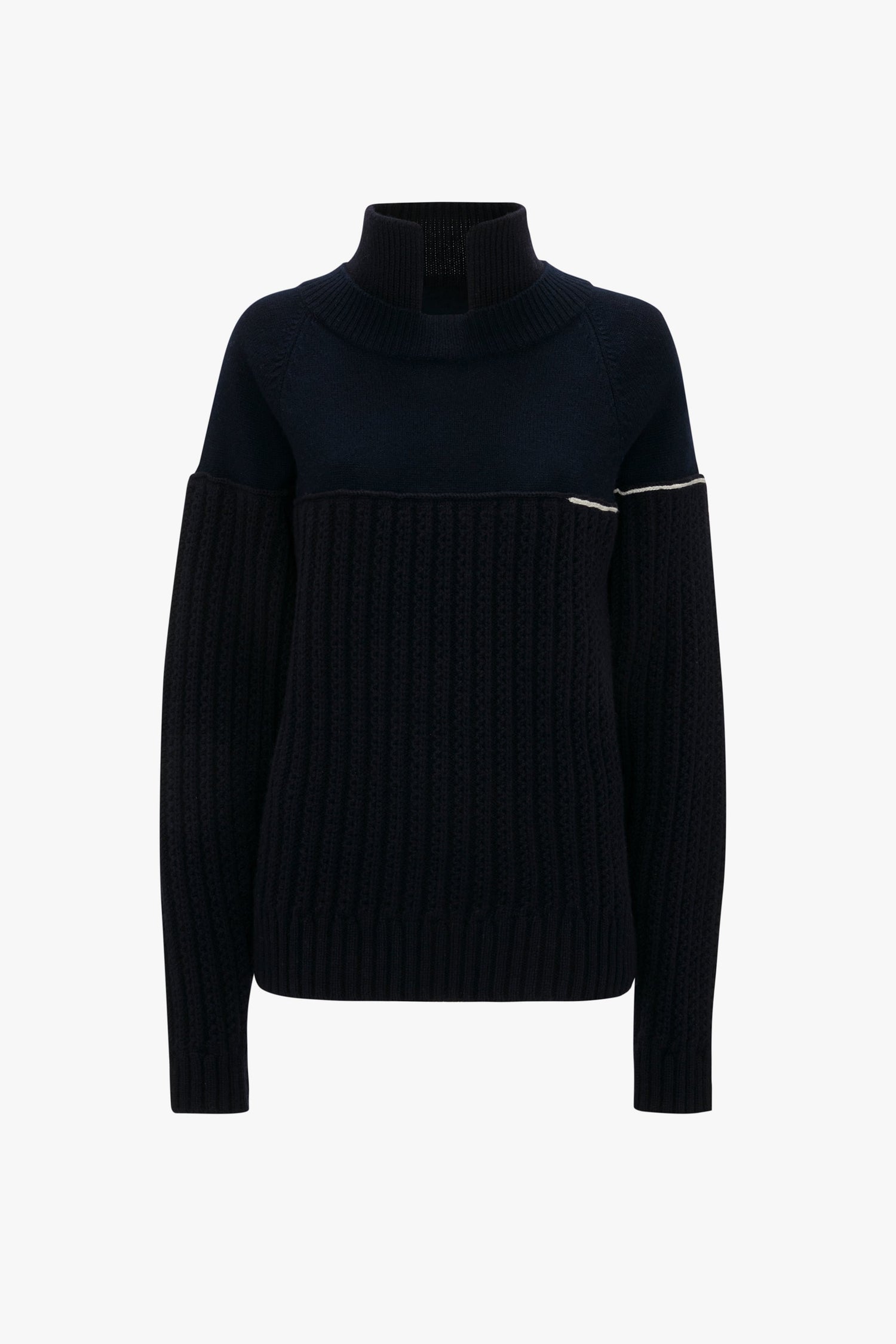 A navy Collar Detail Jumper by Victoria Beckham with a high ribbed collar, long sleeves, and a distinct pattern change below the collar offers a contemporary perspective on classic design.