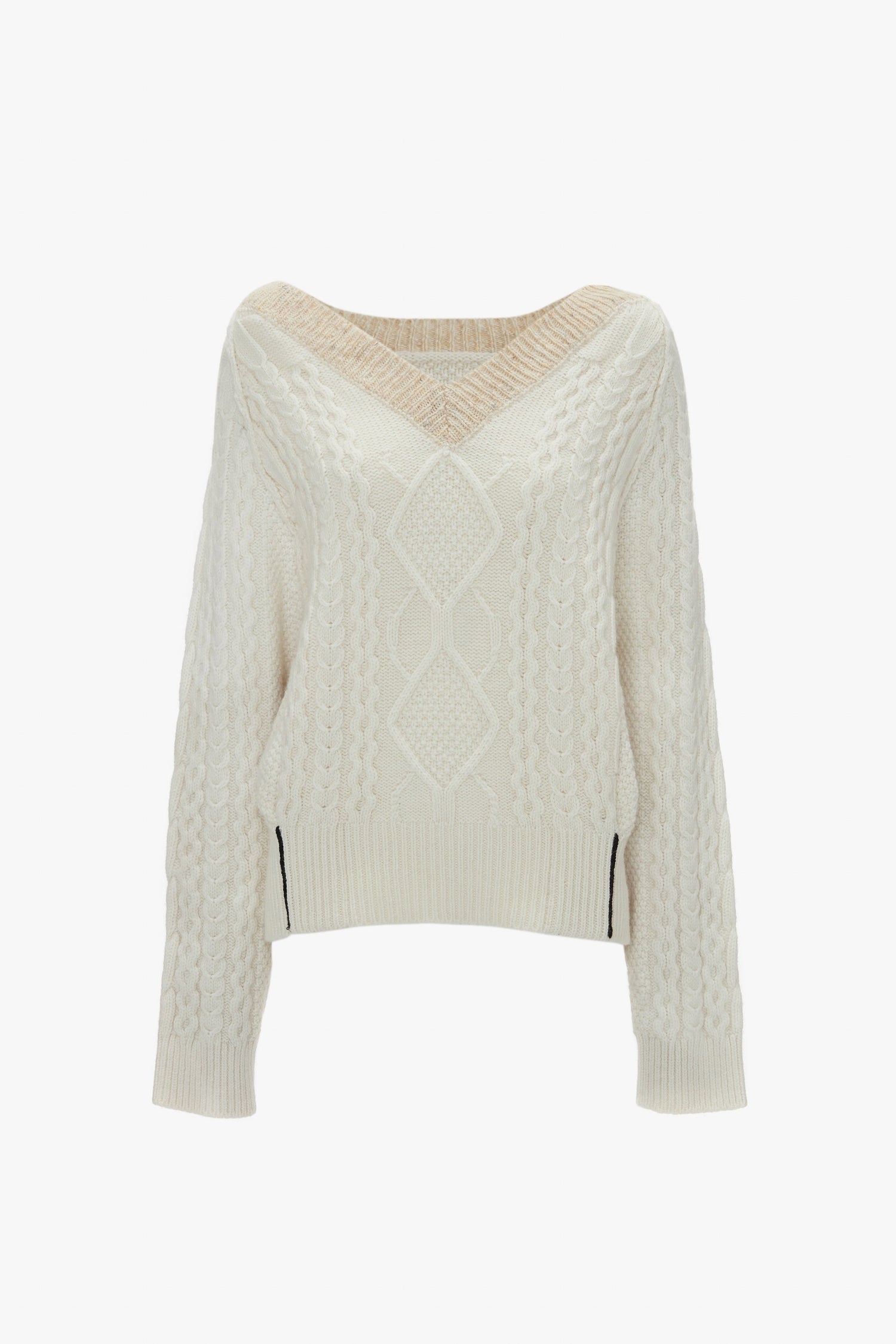 Cream V-neck jumper with a traditional cable knit design and long sleeves. Crafted from pure lambswool, the Victoria Beckham V-Neck Jumper In Natural features intricate patterns and details throughout.