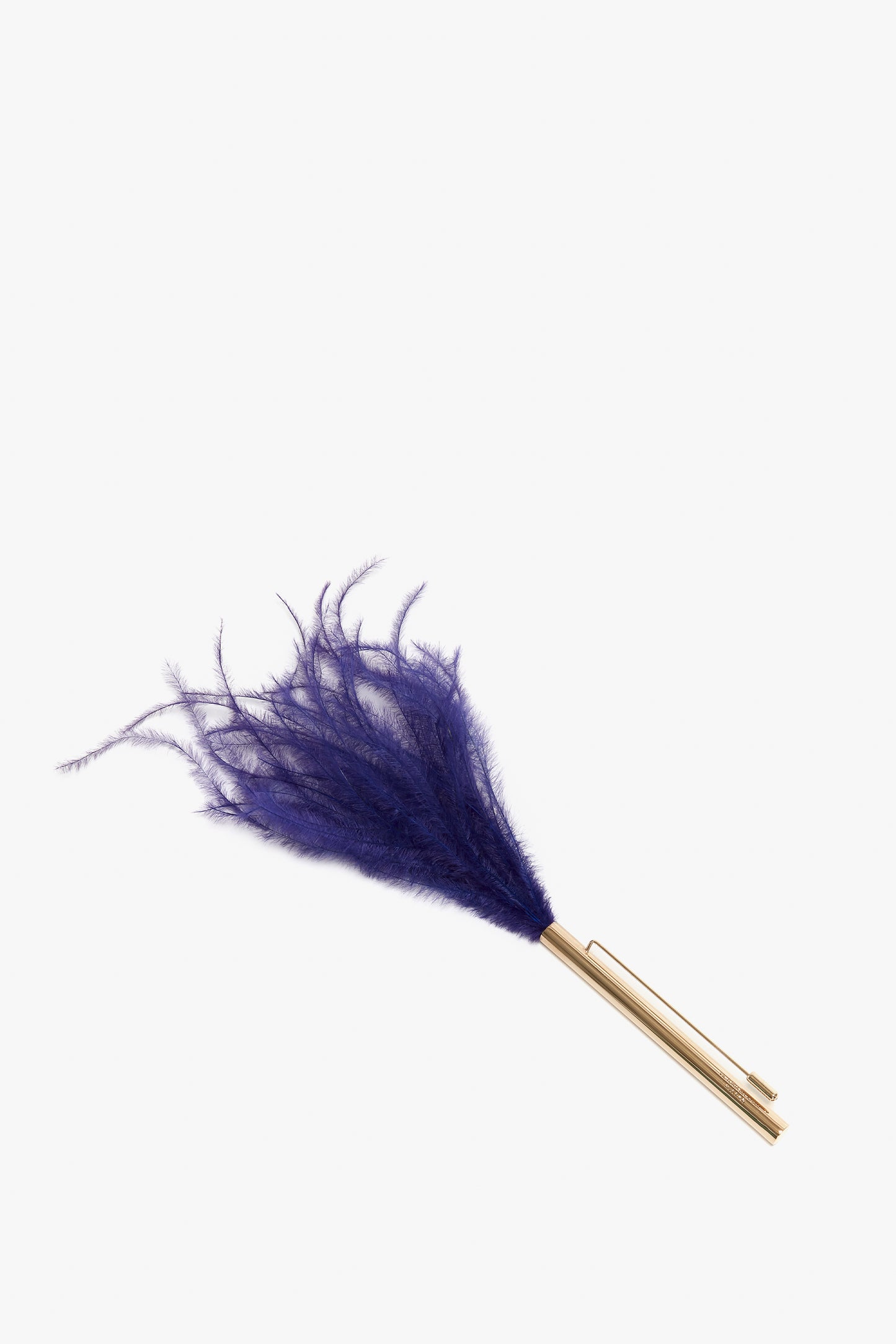 A Feather Brooch In Purple by Victoria Beckham against a white background.