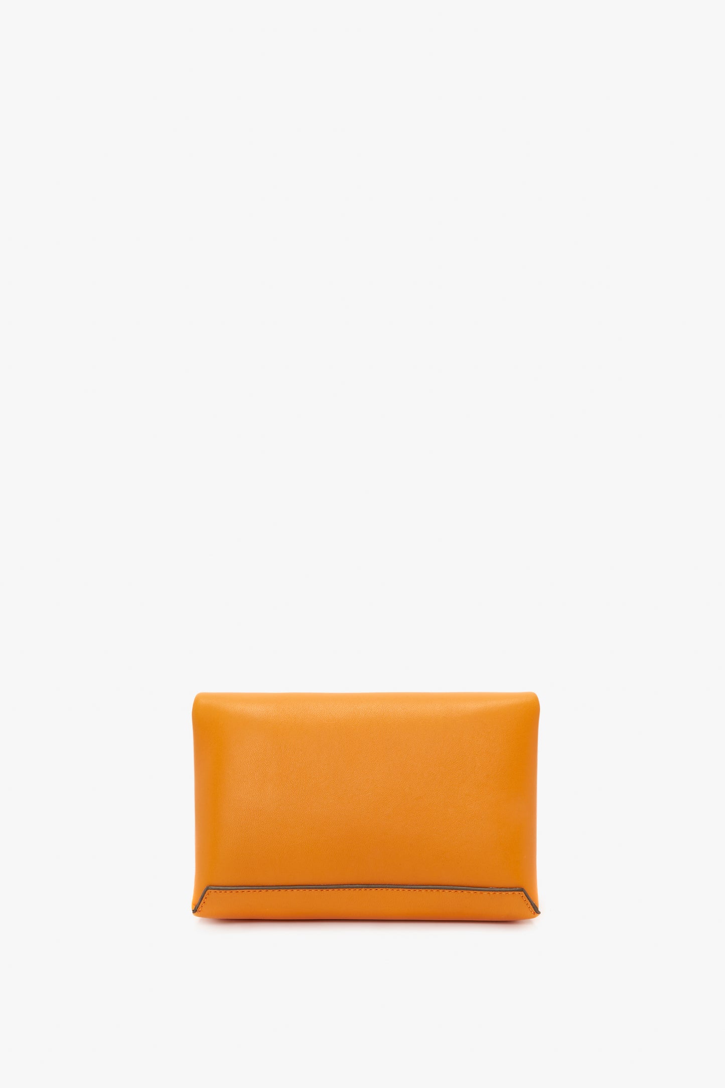 A Victoria Beckham Mini Chain Pouch Bag With Long Strap In Mandarin Leather, featuring a bright mandarin hue, set against a white background.