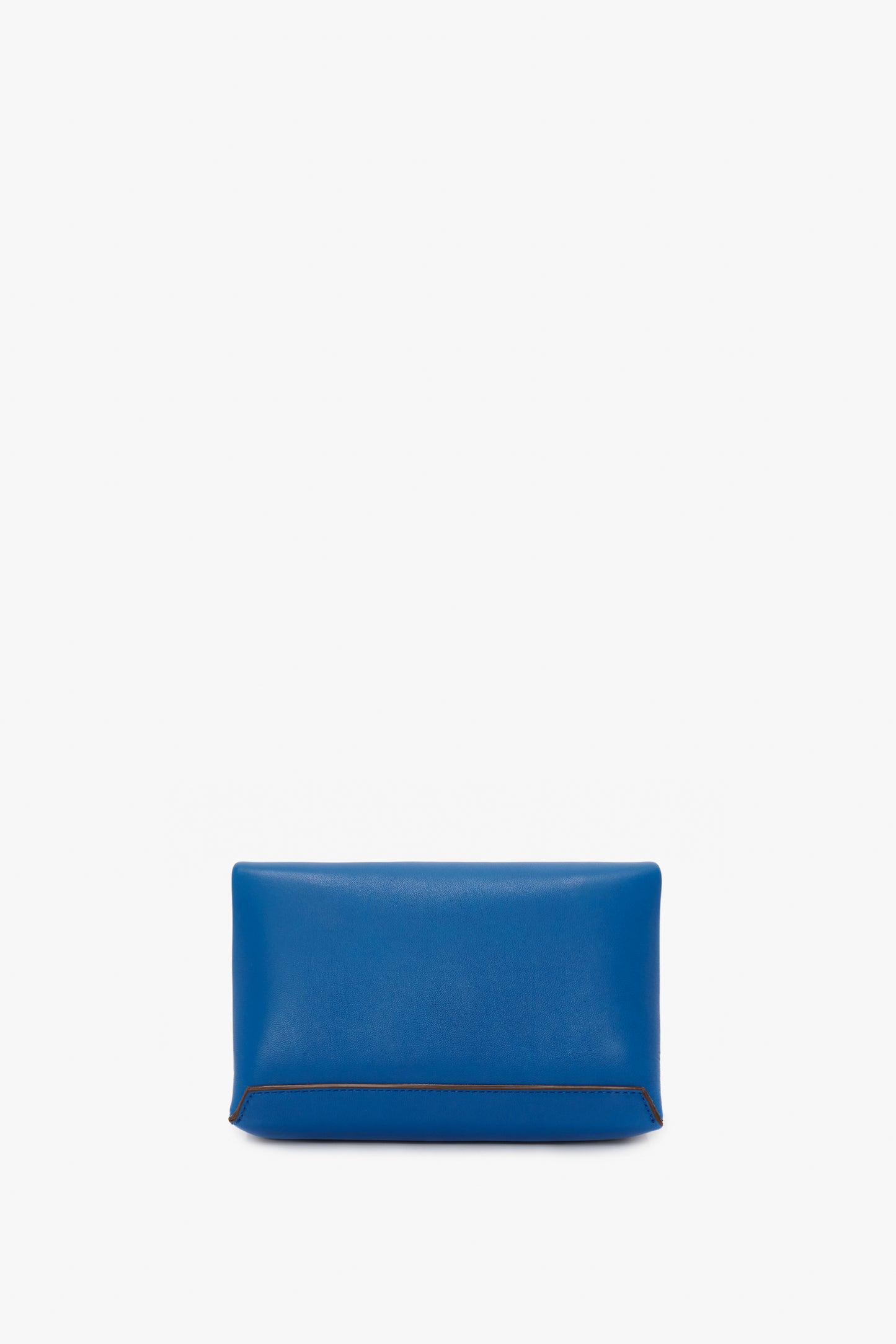 A Victoria Beckham Mini Chain Pouch Bag With Long Strap In Sapphire Blue with a smooth texture and minimal design against a white background.