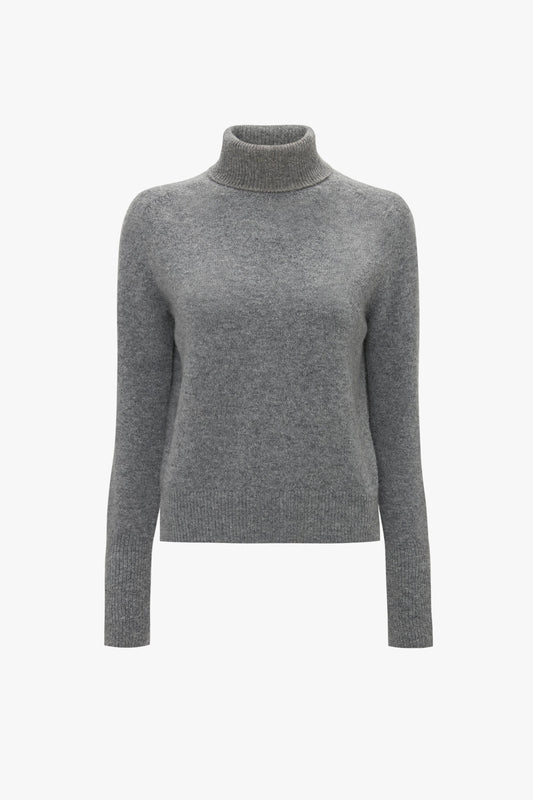 A Victoria Beckham Polo Neck Jumper In Grey Melange against a white background offers versatile styling and enduring comfort.