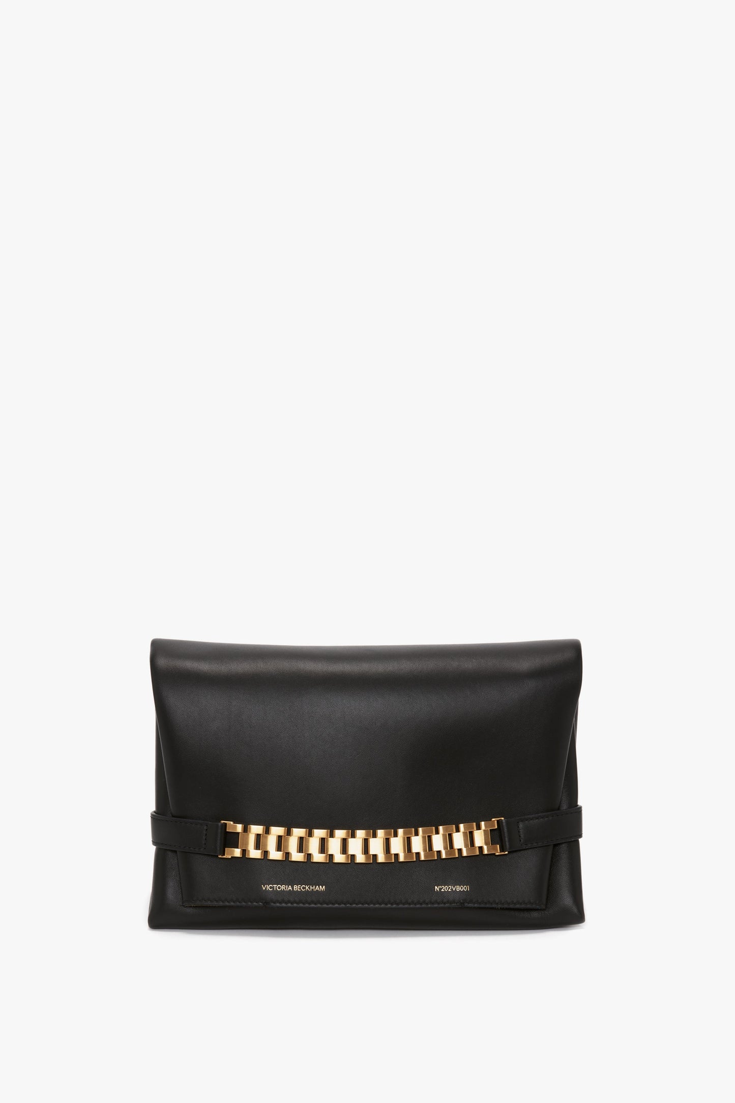 A black Chain Pouch Bag with Strap In Black Leather by Victoria Beckham featuring a gold chain detail on the front and a detachable handle for versatile styling.