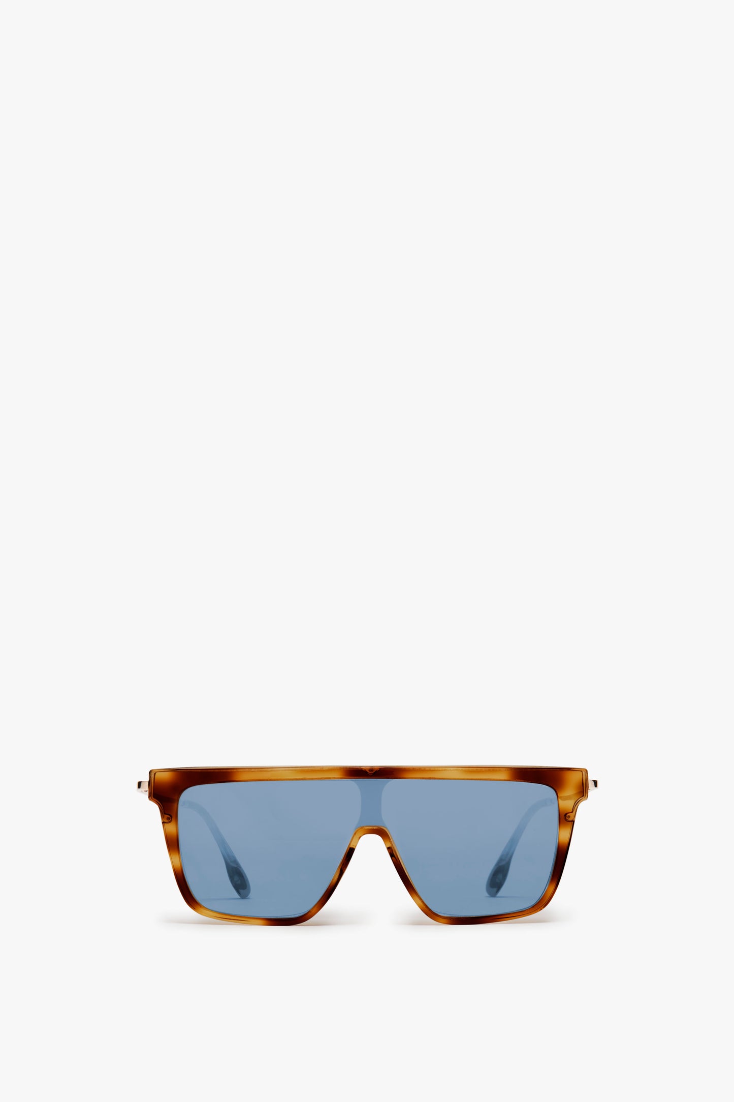 Front view of Victoria Beckham Rectangular Shield Sunglasses In Tortoise with light blue lenses and metal temples against a white background.